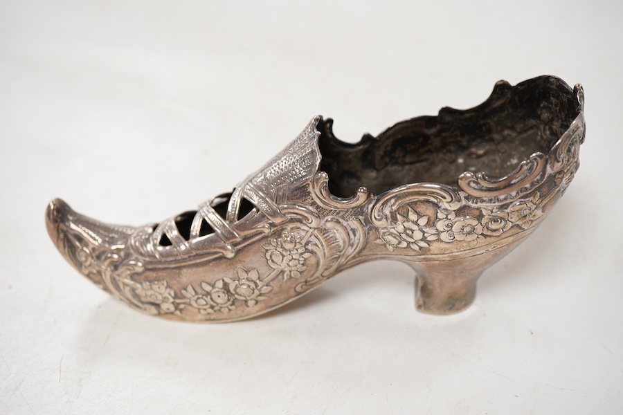 An early 20th century Hanau large novelty silver pin cushion(lacking cushion), modelled as a lady's shoe, import marks for Berthold Muller, Chester, 1907, 15.5cm, 4.8oz.